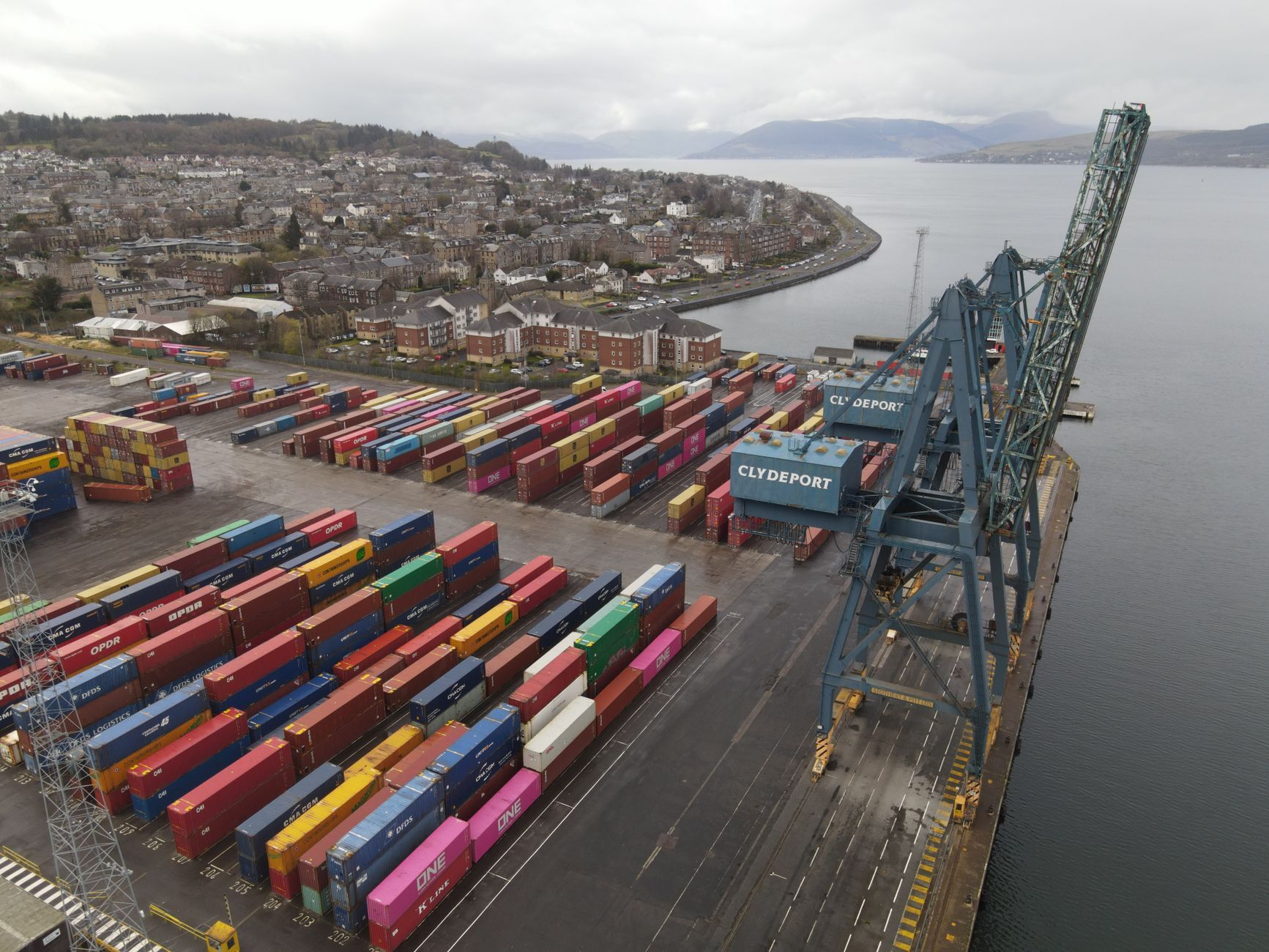 Aerial view of cargo container ships at a busy port