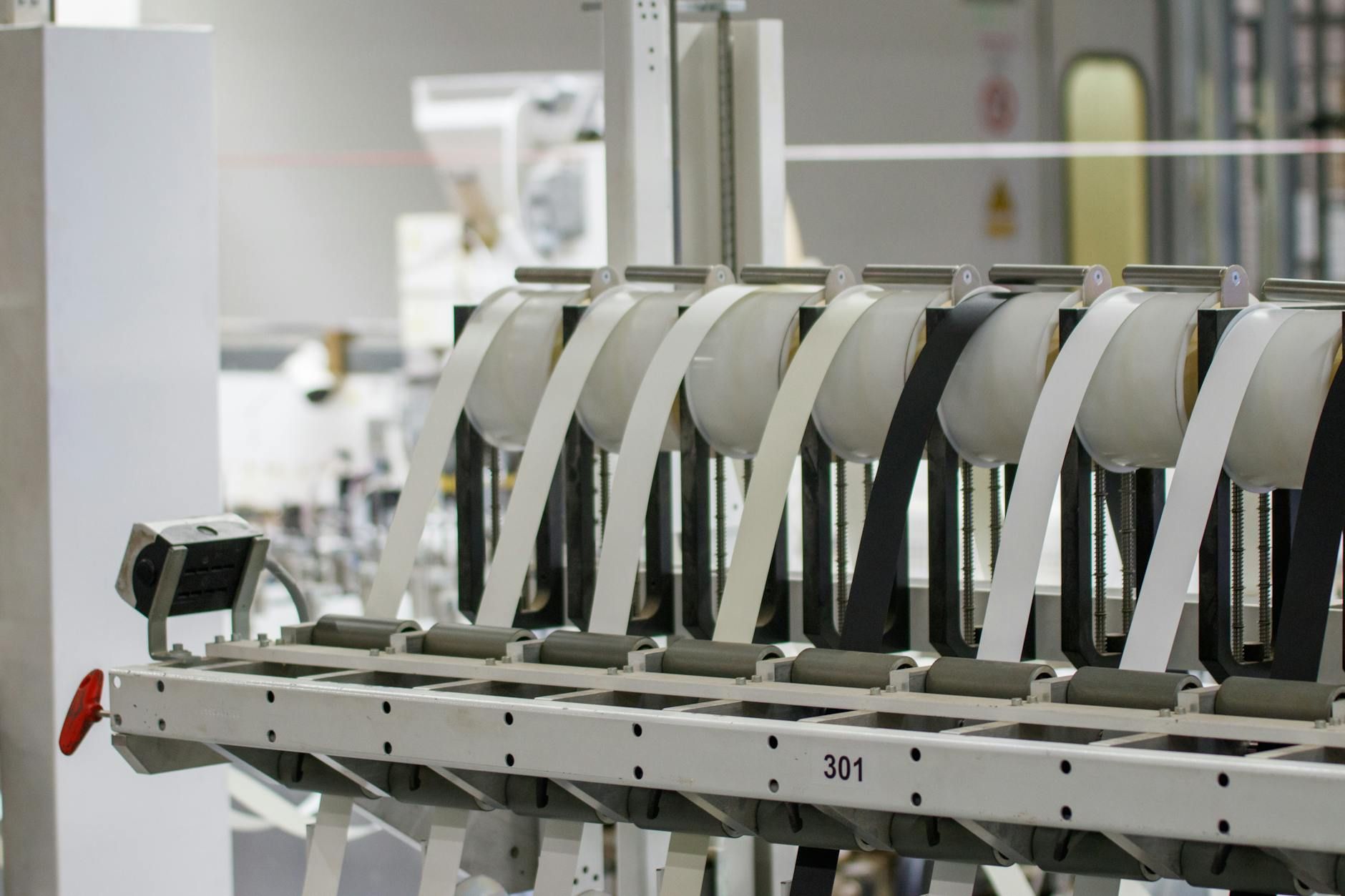Workers on a factory manufacturing production line